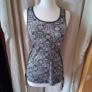 midnight hour black and white skull and lace up detail on the side tank size S/M